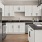 a kitchen with white cabinets