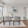 a dining room with a table and chairs