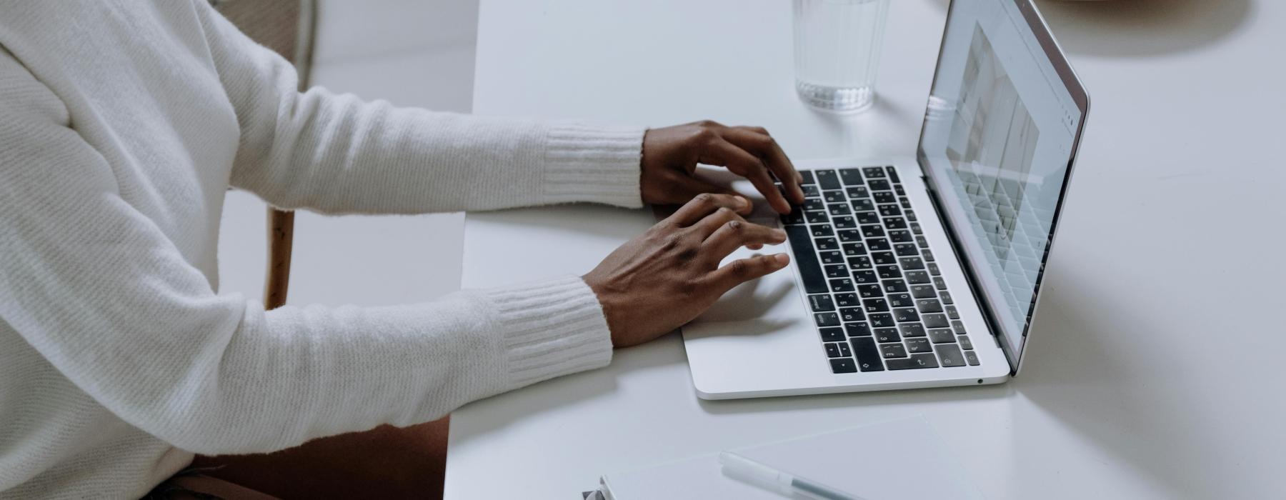 a woman working on a laptop