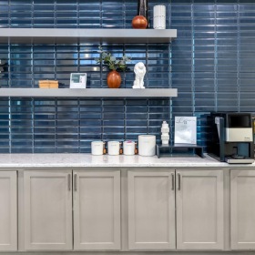 a kitchen with white cabinets